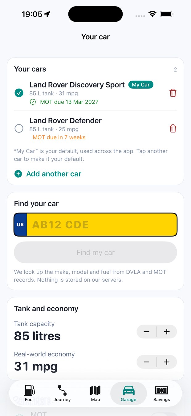 The Garage screen: two Land Rovers with tank size, real-world mpg and MOT dates, plus a UK number plate field to look a car up.